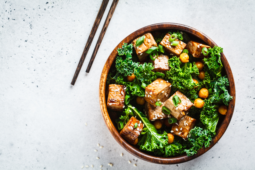 Tofu cooking: bowl of tofu and chopsticks